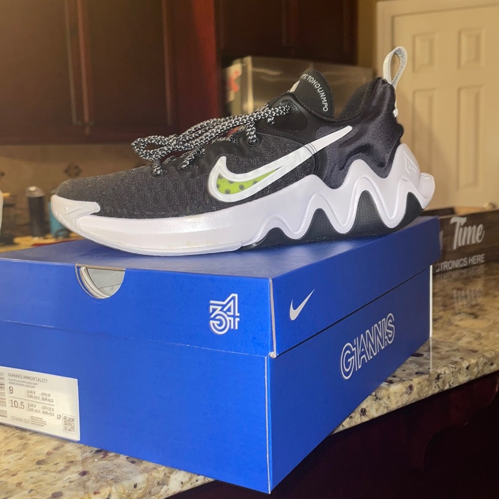 Black Nike athletic shoes